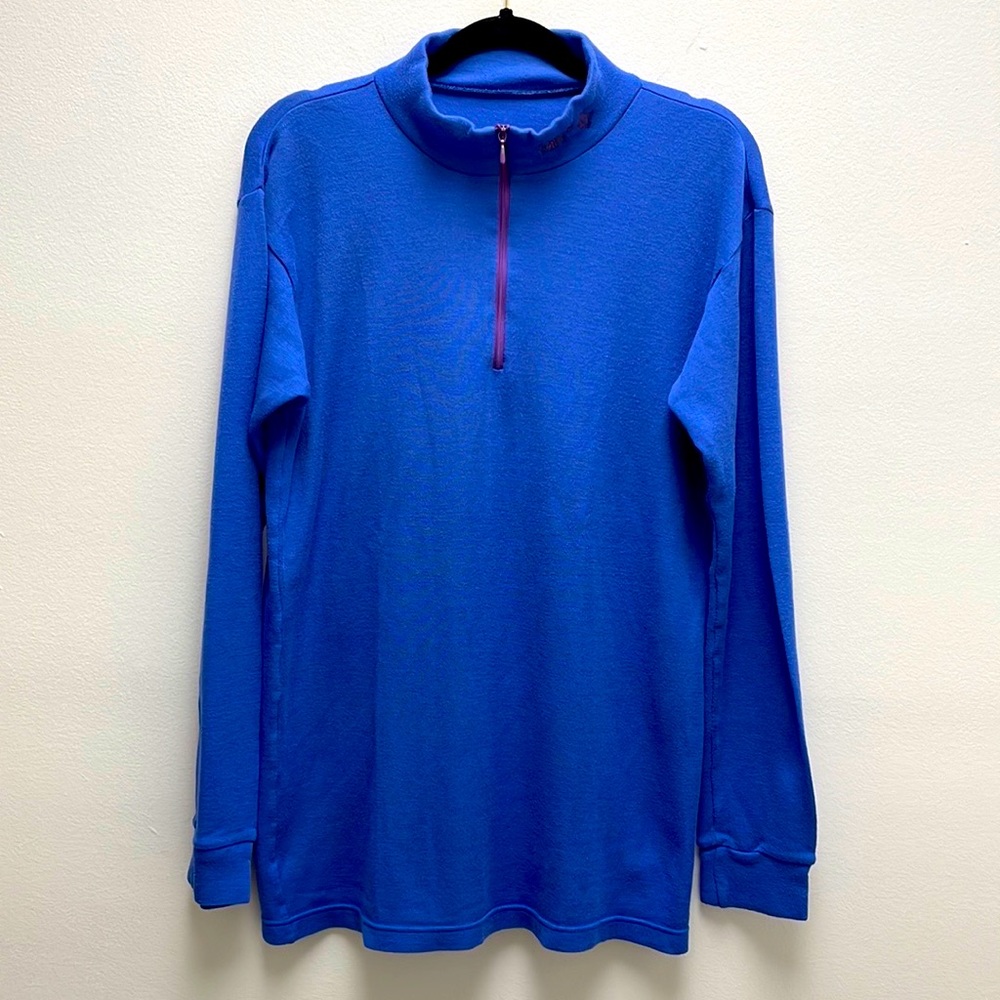 North Cape Scotland zip neck long sleeve tech fabric performance shirt.